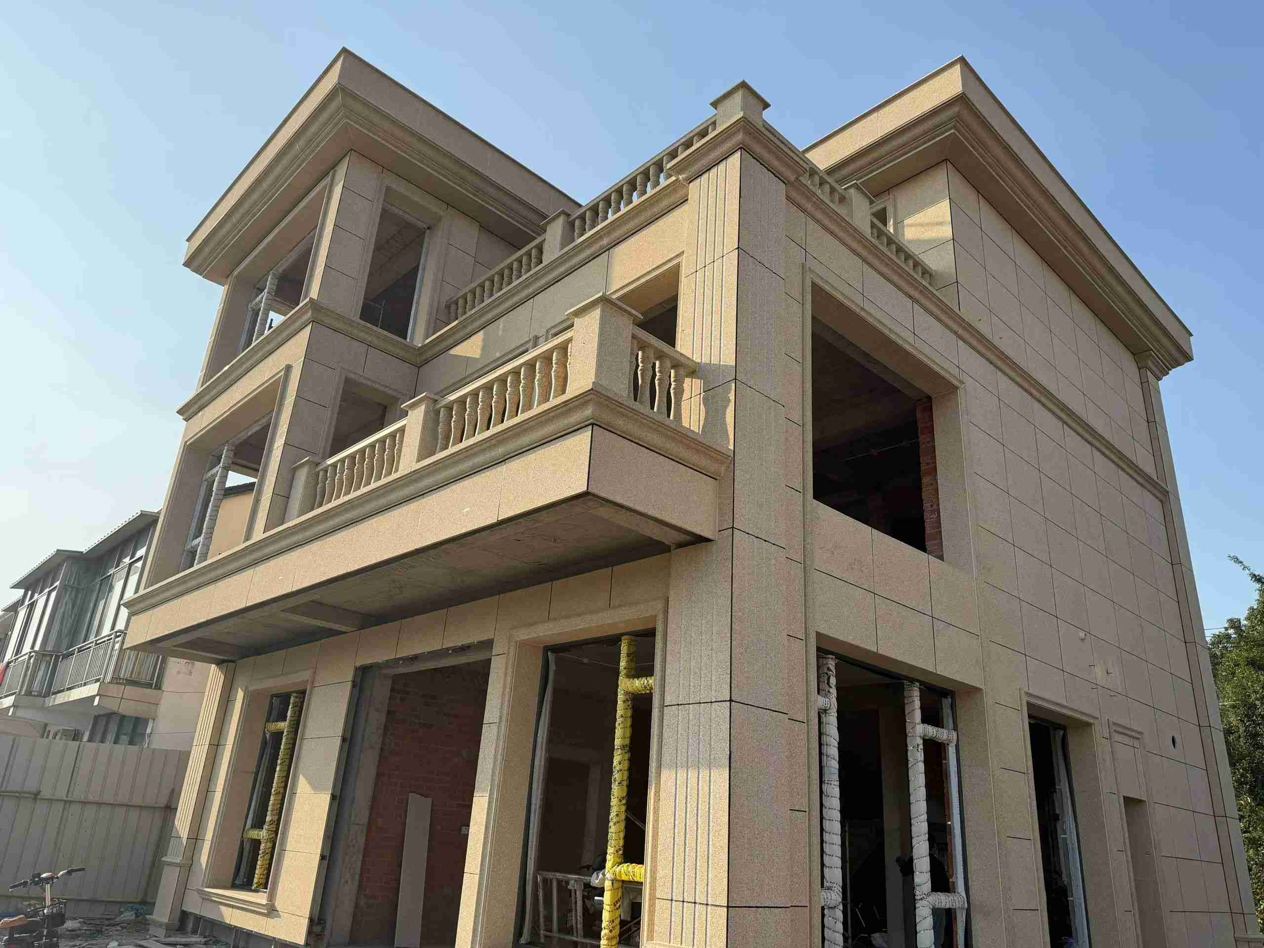 茂名 黄金麻花岗岩石材荔枝面外墙干挂效果展示